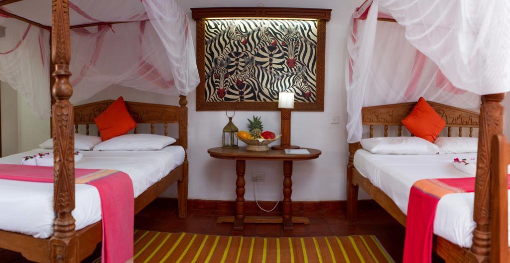 Mangro Hotel Praia de Diani Quarto foto