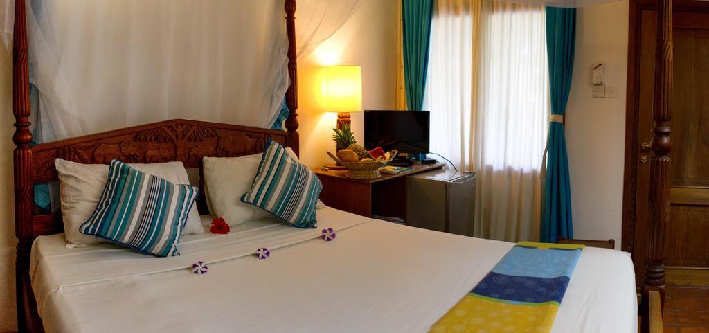 Mangro Hotel Praia de Diani Quarto foto